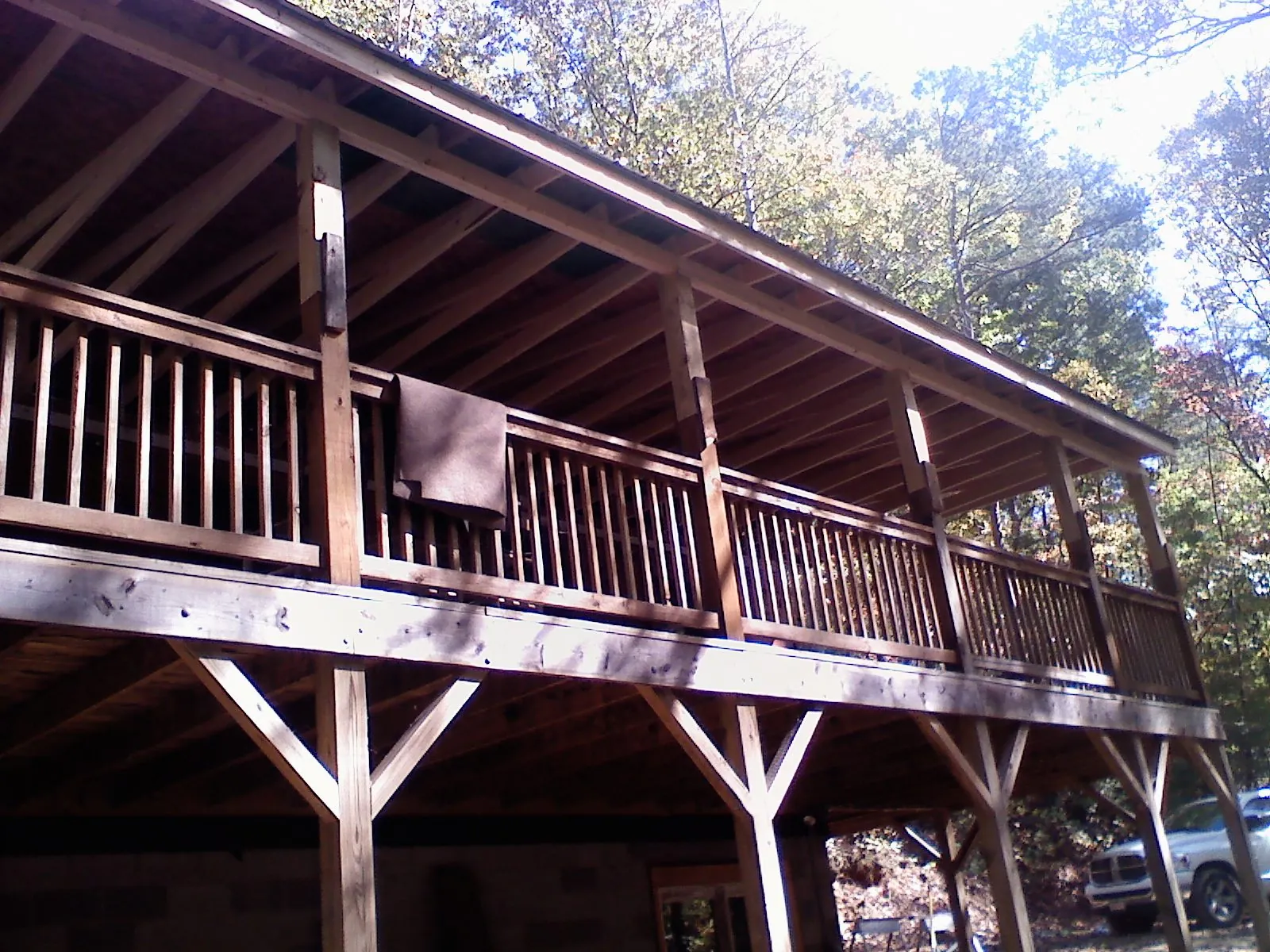 Timber framing under a new elevated porch and deck — Roof Leak Repair in Magna by Roofing Brothers